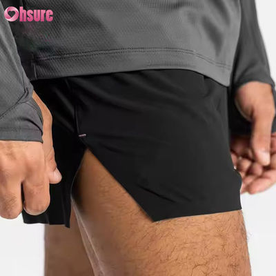 Individuelle Reißverschlusstaschen Elastischer Bund Sport-Aktivkleidung Herren Jacquard-Druck Workout Lauf-Gymnastik-Shorts