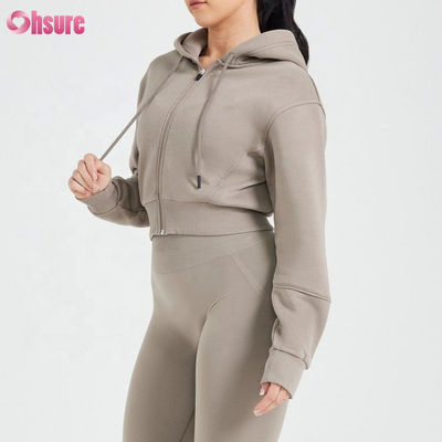 Anpassungsfähige Damen Zip-Up Hoodies Schlanke Passform Geschnittenes Fitnessstudio Tragen Sie atmungsaktive Strickgewebe für Frauen